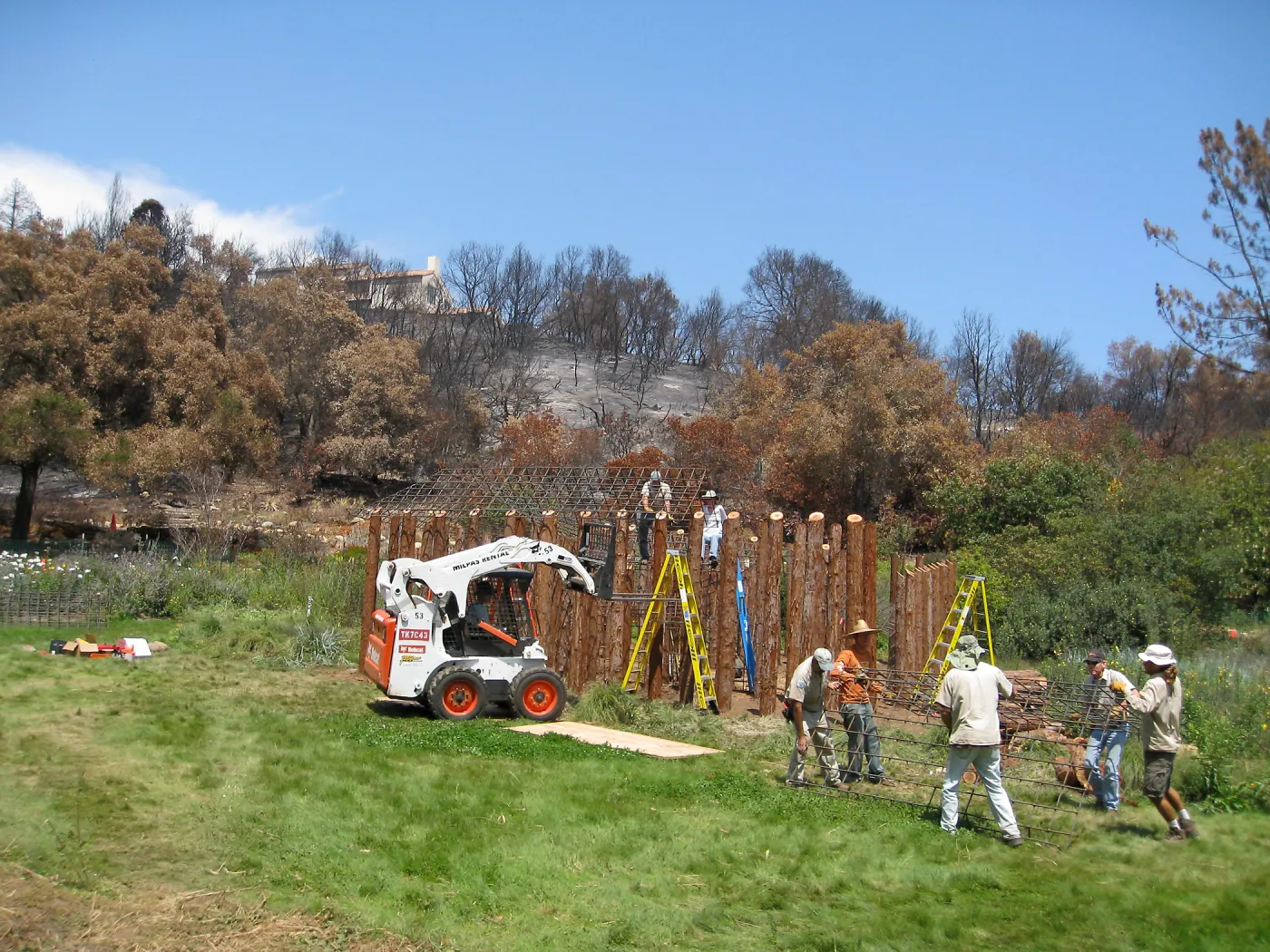 Construction of Herb Parker's â€˜Haven' labyrinth, placing roof structure
