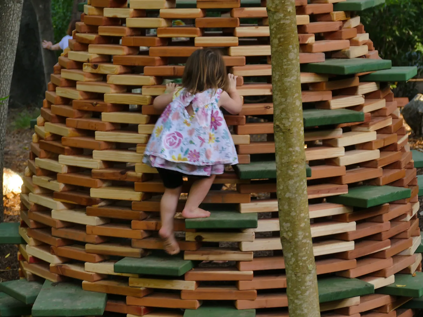 Santa Barbara Botanic Garden Casitas Opening, child playing on â€œThe Hivesâ€ Casita