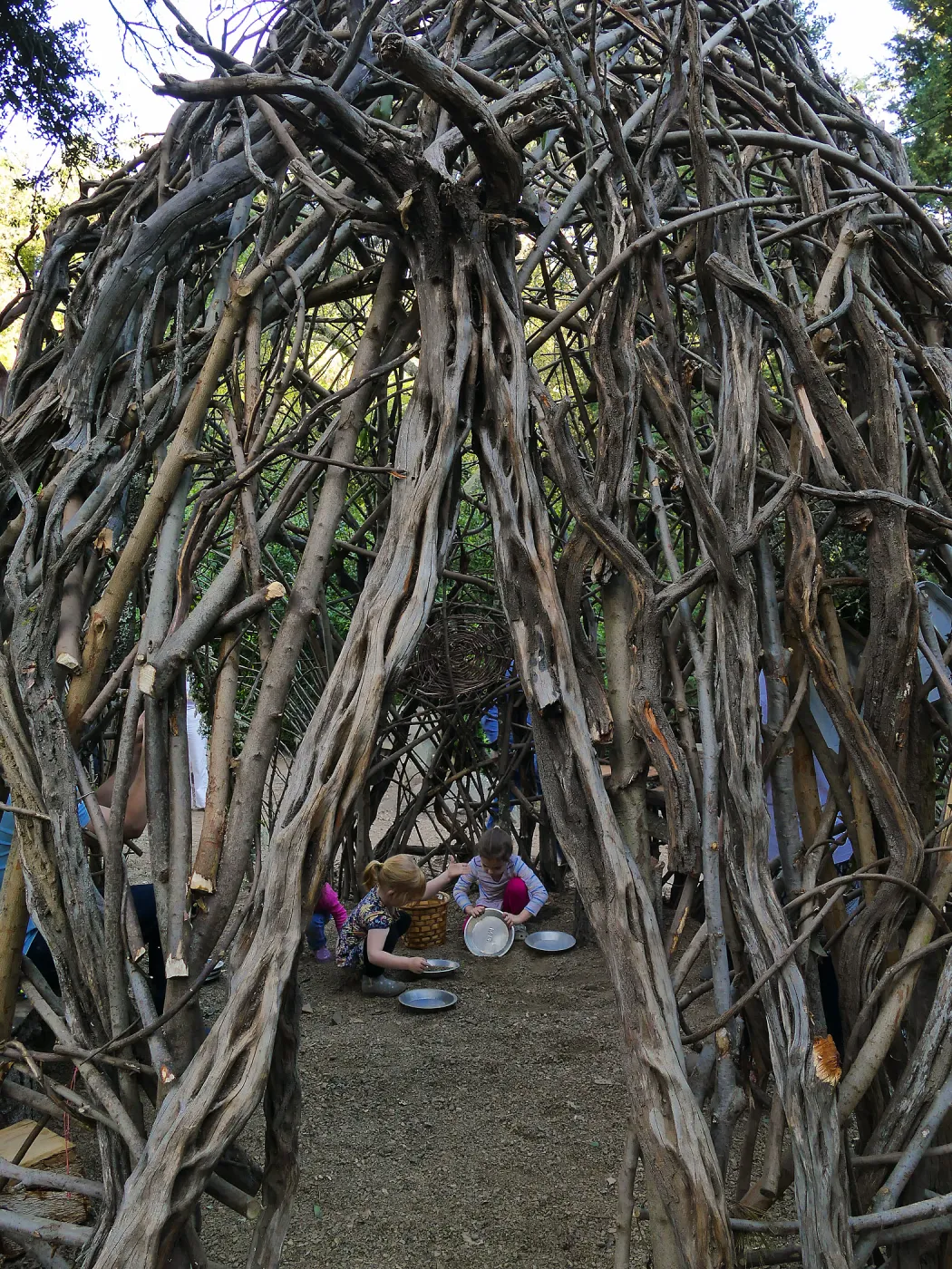 Santa Barbara Botanic Garden Casitas Opening, children playing in the â€œWoodrat Houseâ€ Casita