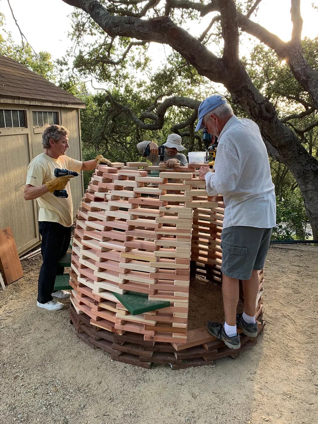 Volunteers building â€˜The Hives' casitas