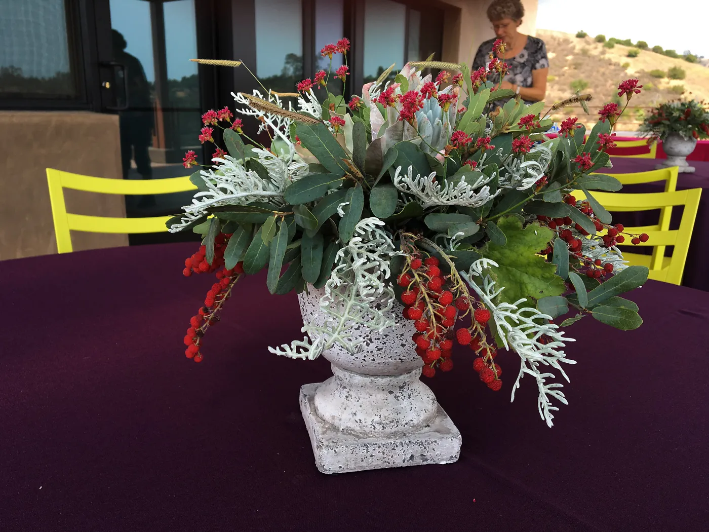 Flower arrangement with toyon berries