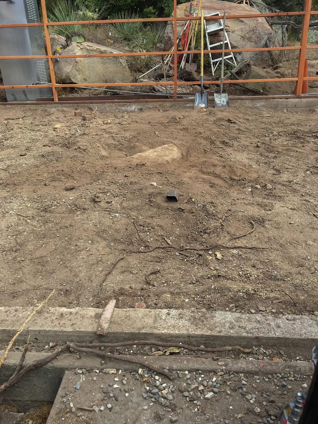 Repair of Garden Growers Lath House. Boulders to remove, looking north
