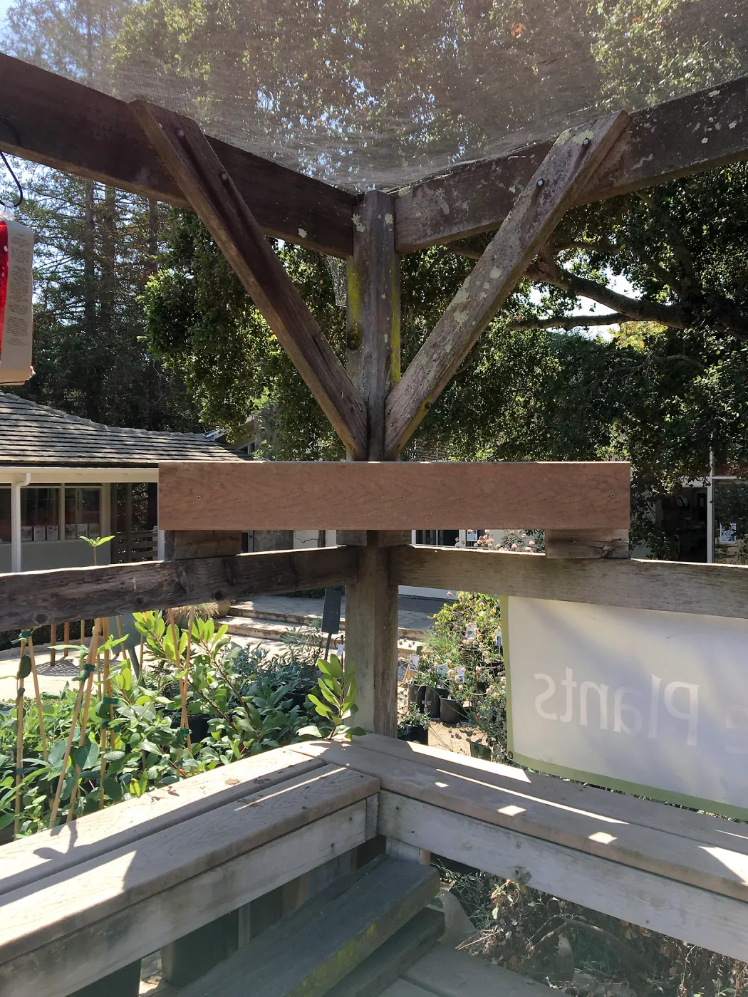 Repair of Garden Growers shade structure, looking southeast