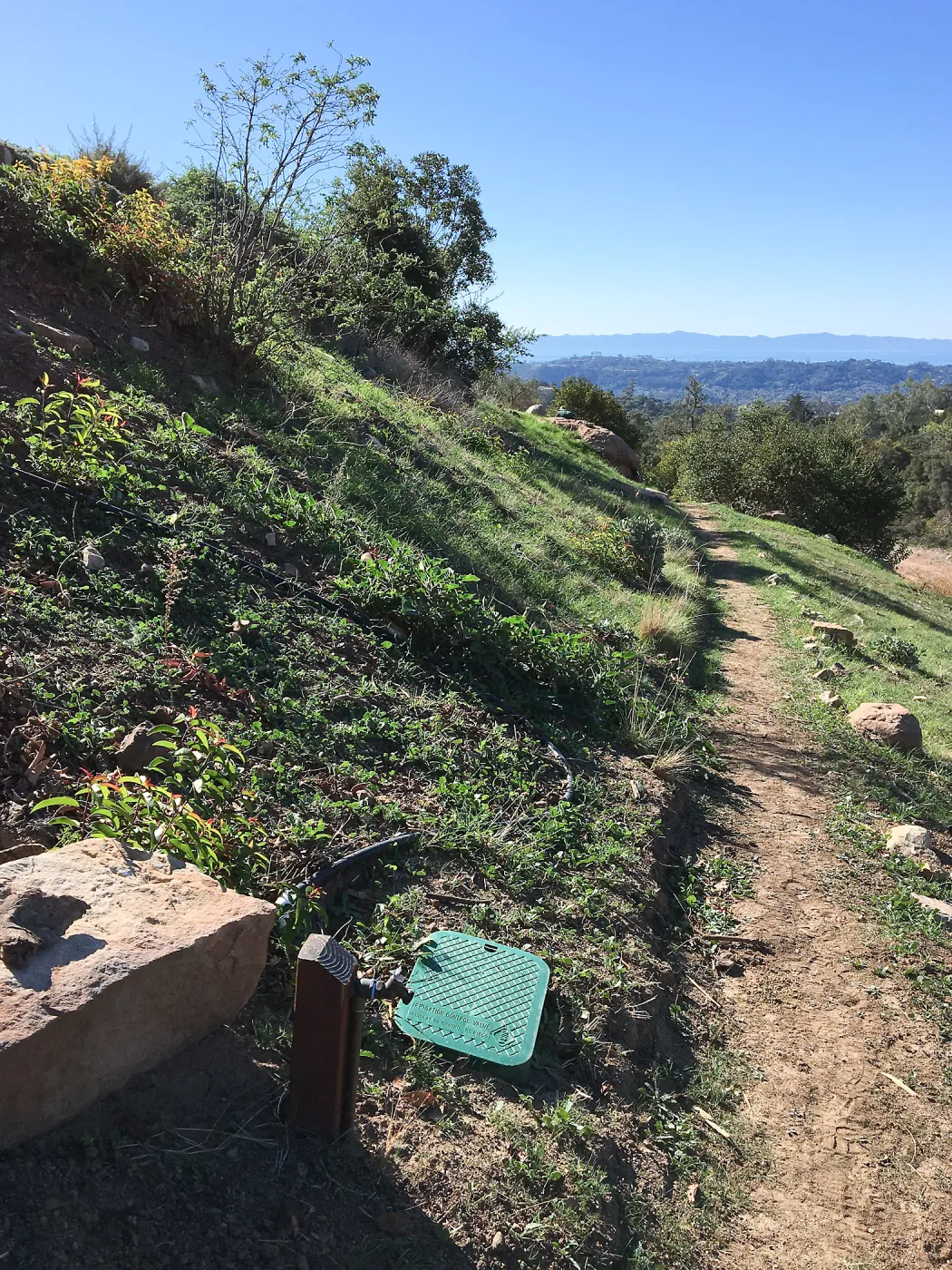 Building new trail on west slope of PCC ridge for new Island Section