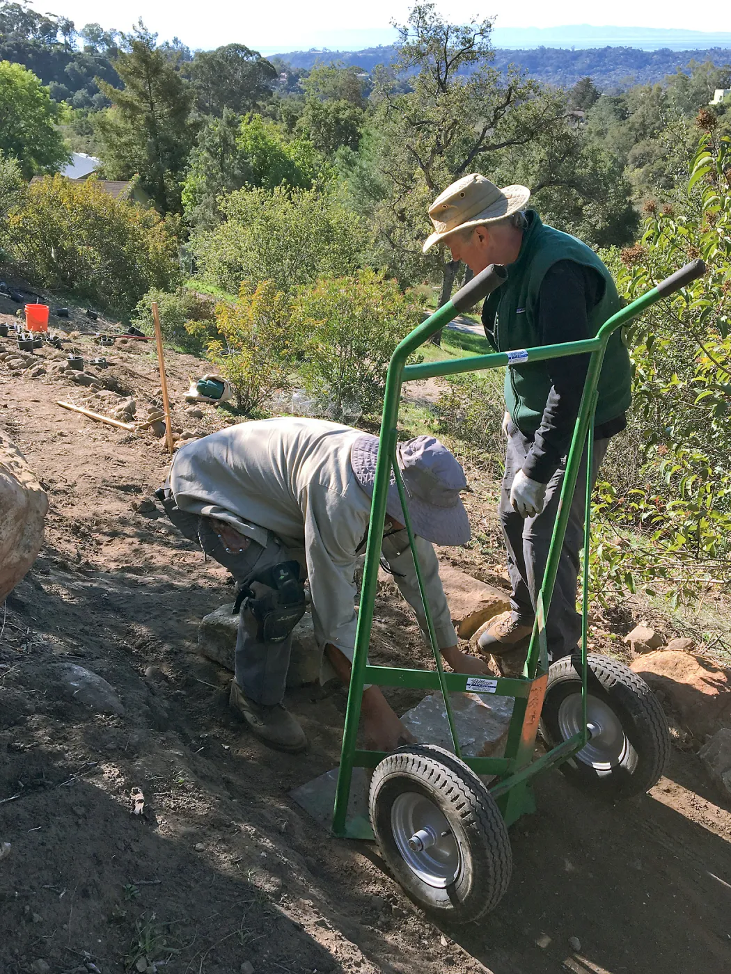 Building new trail on west slope of PCC ridge for new Island Section