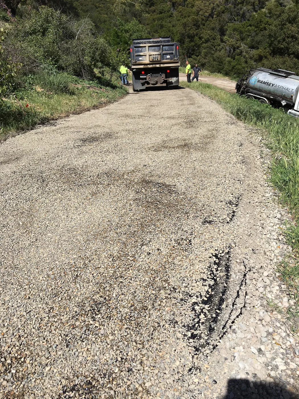 Chip sealing service road on East Slope of Garden