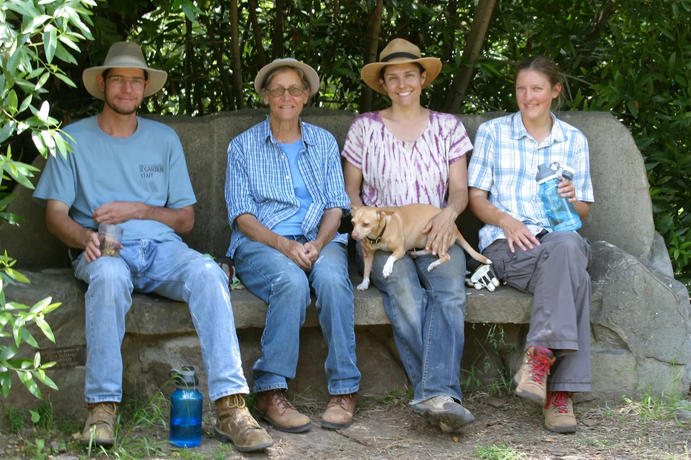 Charlie Adams, Katie Adams, Betsy Lape and Ginger, and Emily Adams at the Studebaker Bench