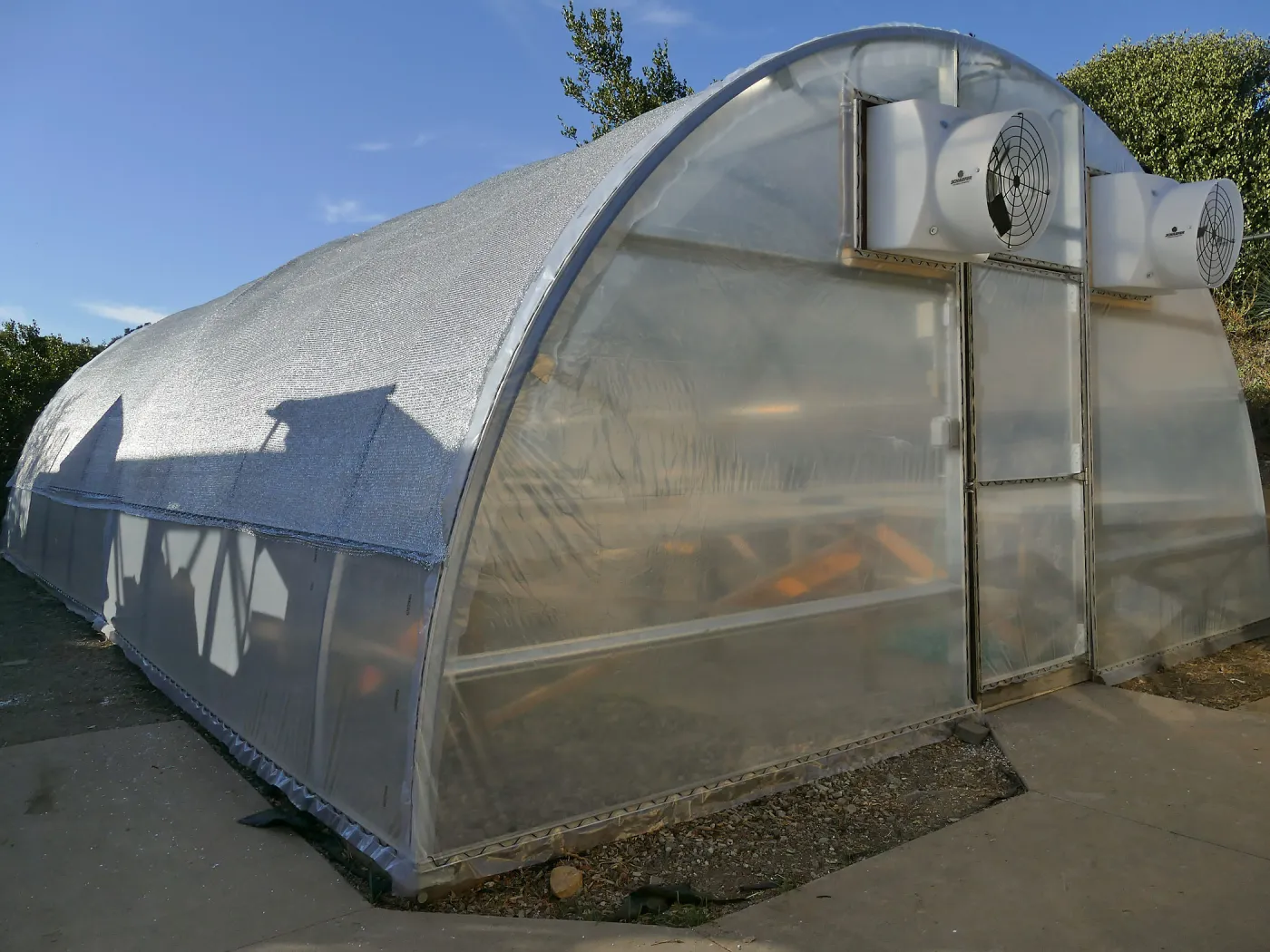 Southeast corner of the Hoop House at Horticulture Unit after installation of reflective shade covering