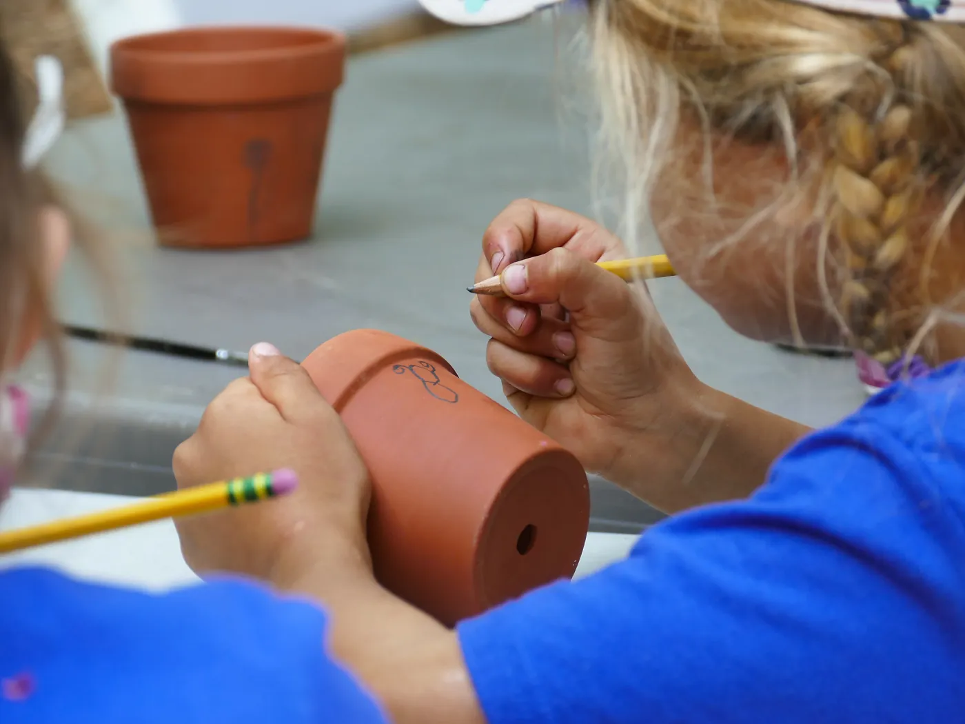 Acorn Adventurers Summer Camp, flower pot decorating activity
