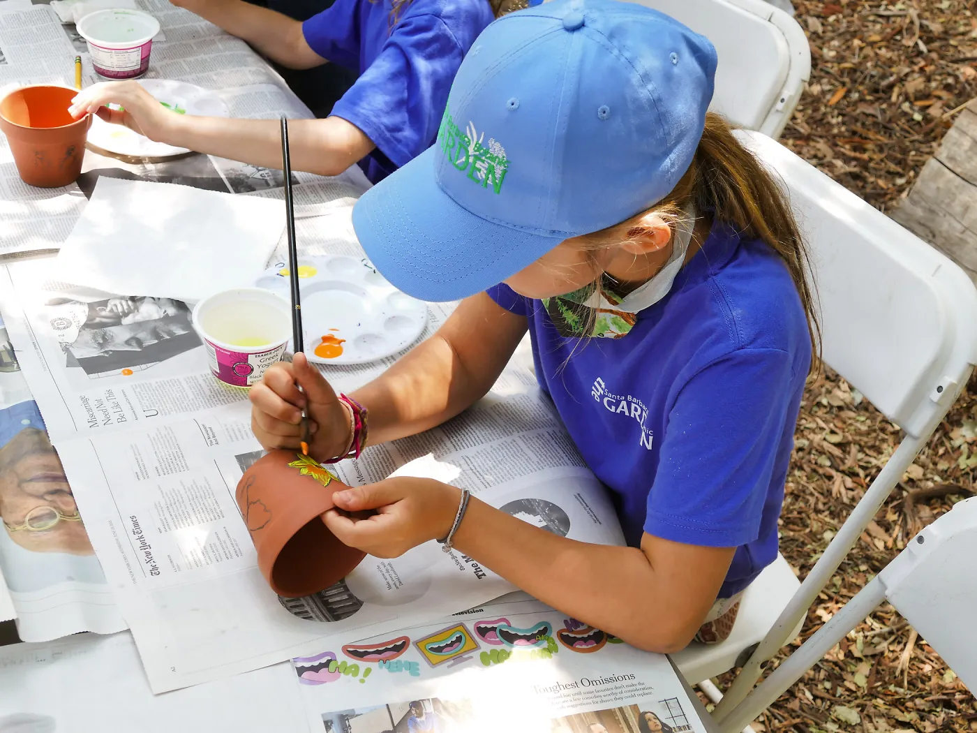 Acorn Adventurers Summer Camp, flower pot decorating activity