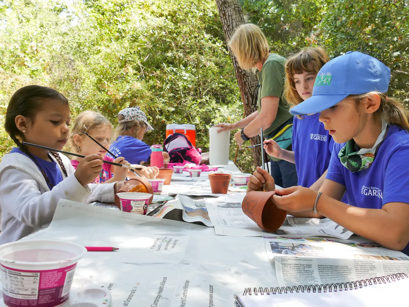 Acorn Adventurers Summer Camp, flower pot decorating activity