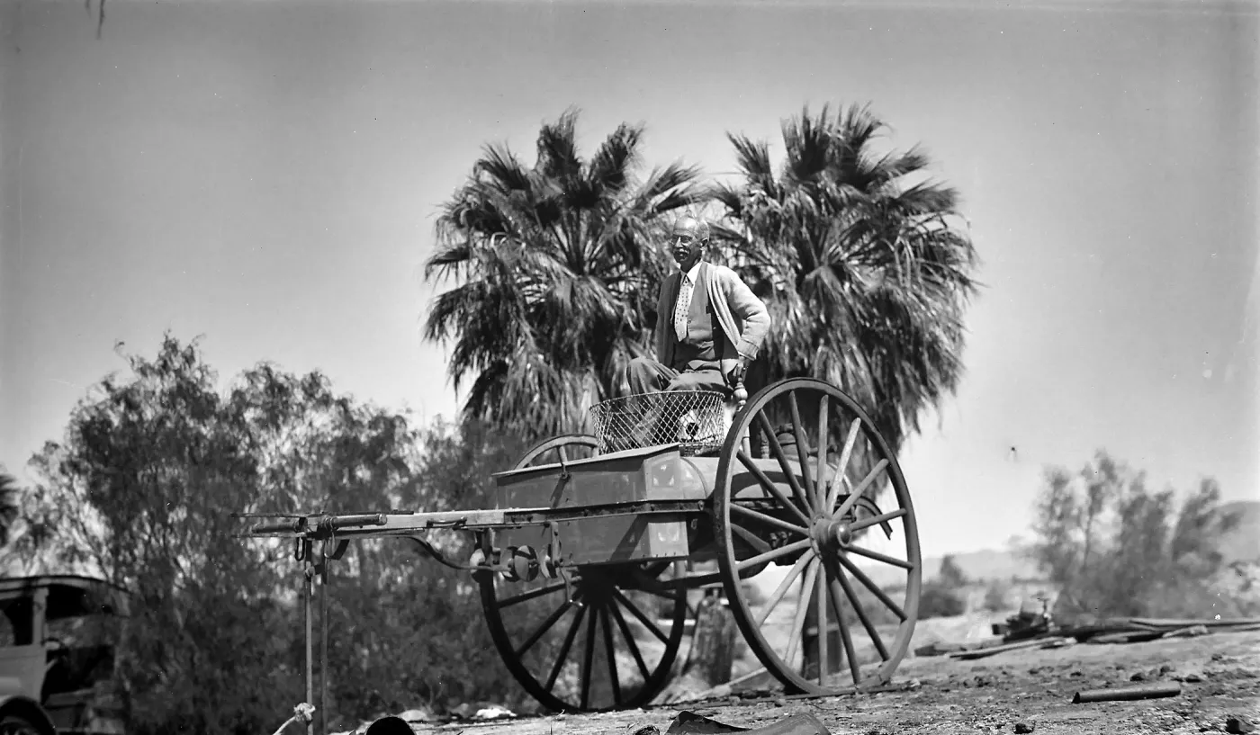 Thousand Palms, man in two-wheeled cart