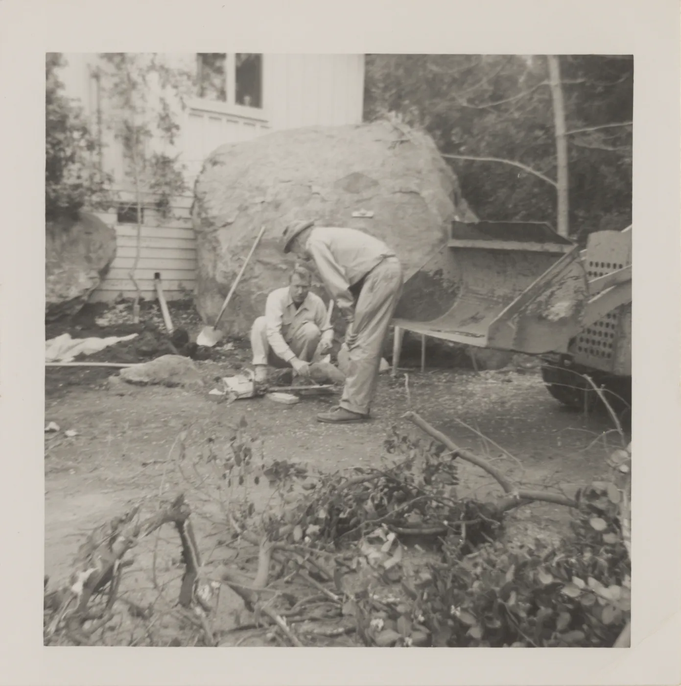 E.R. Blakley and Leonard Allen, grounds work. South side of pre-herbarium building