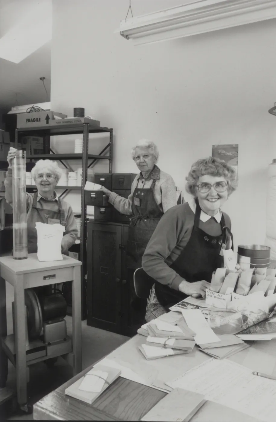 Caroline Connor, Mae Blakley, and jane Lopez enjoying their new seed room.