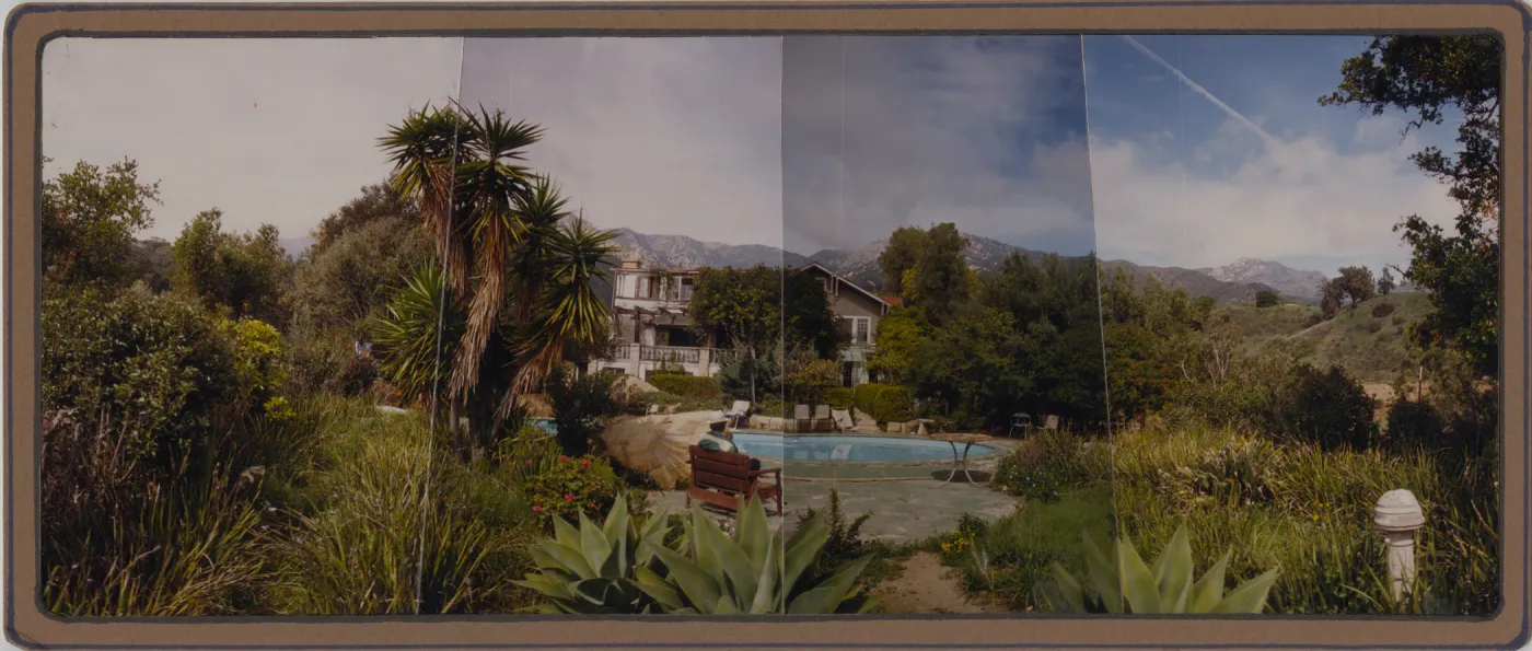 Clif Smith sitting by pool at Gane House