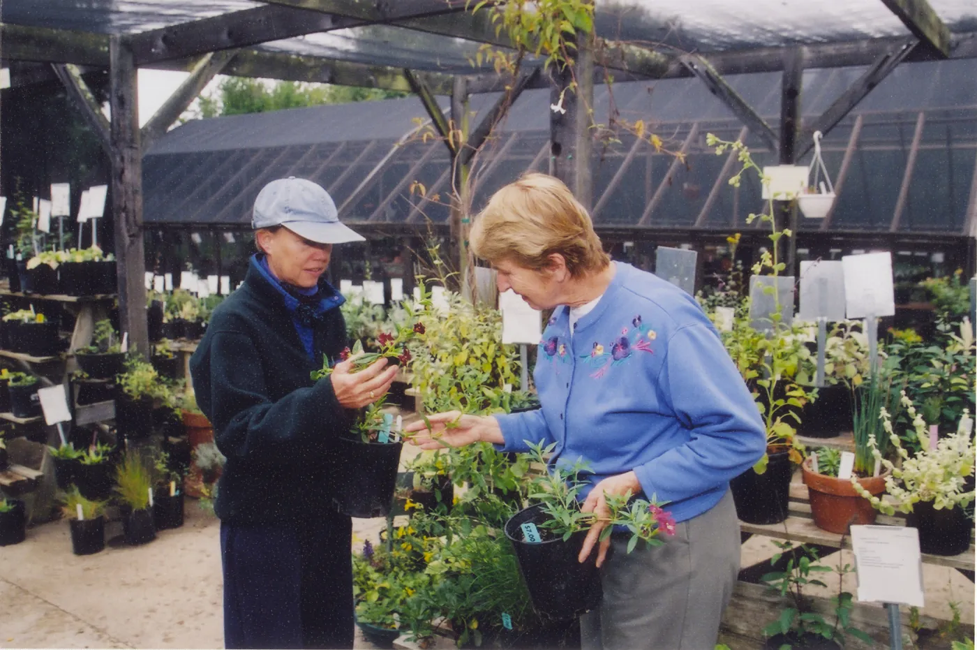 Mary Shehan with visitor in nursery
