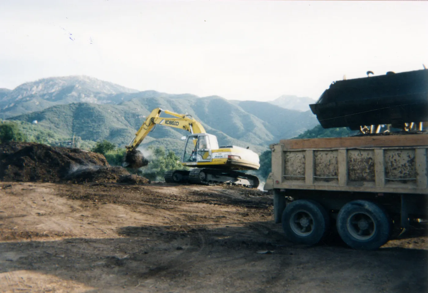 Removal of Mulch pile on ridge above Hort Unit that caught on fire