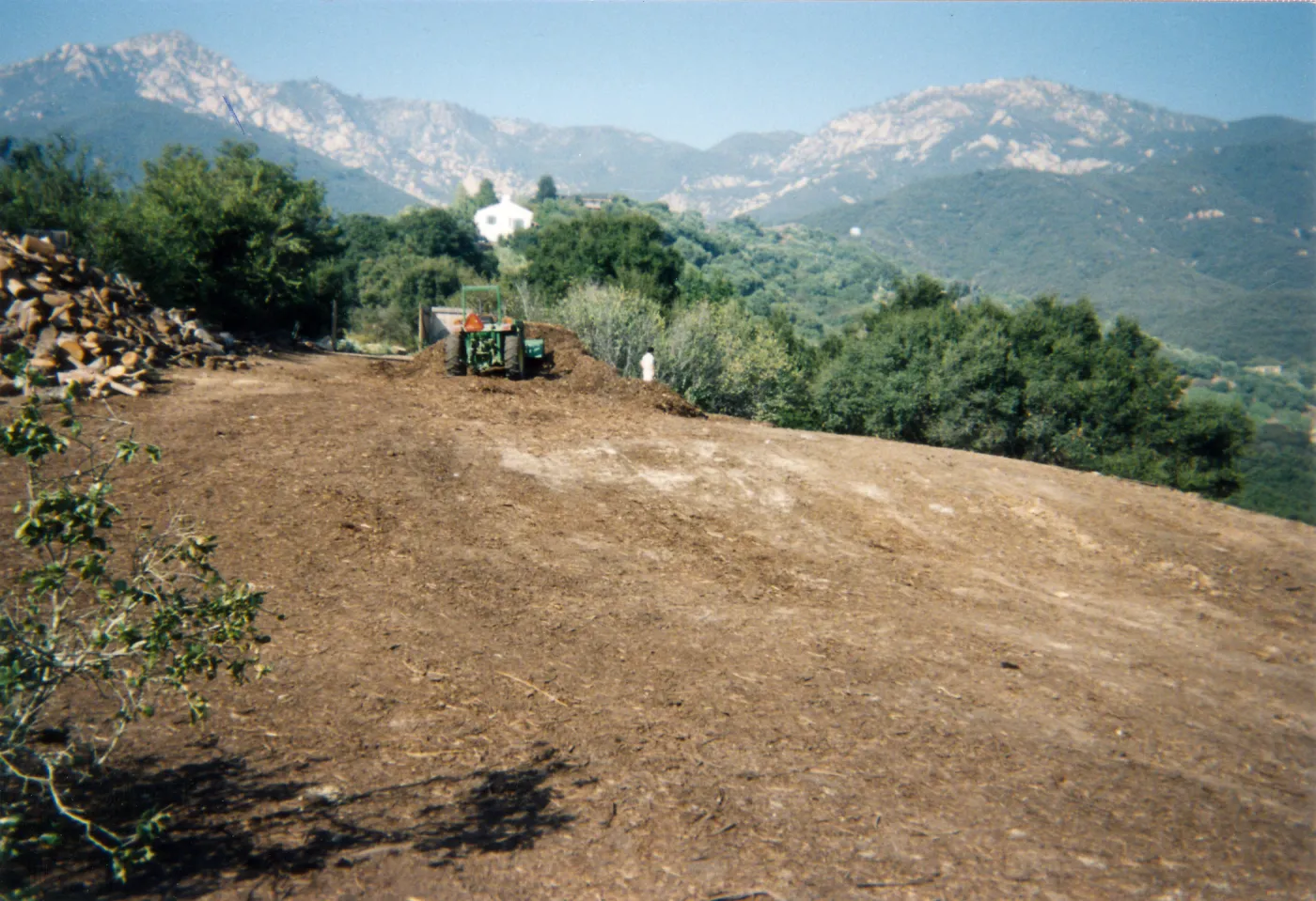 Mulch pile on ridge above Hort Unit that caught on fire and was removed