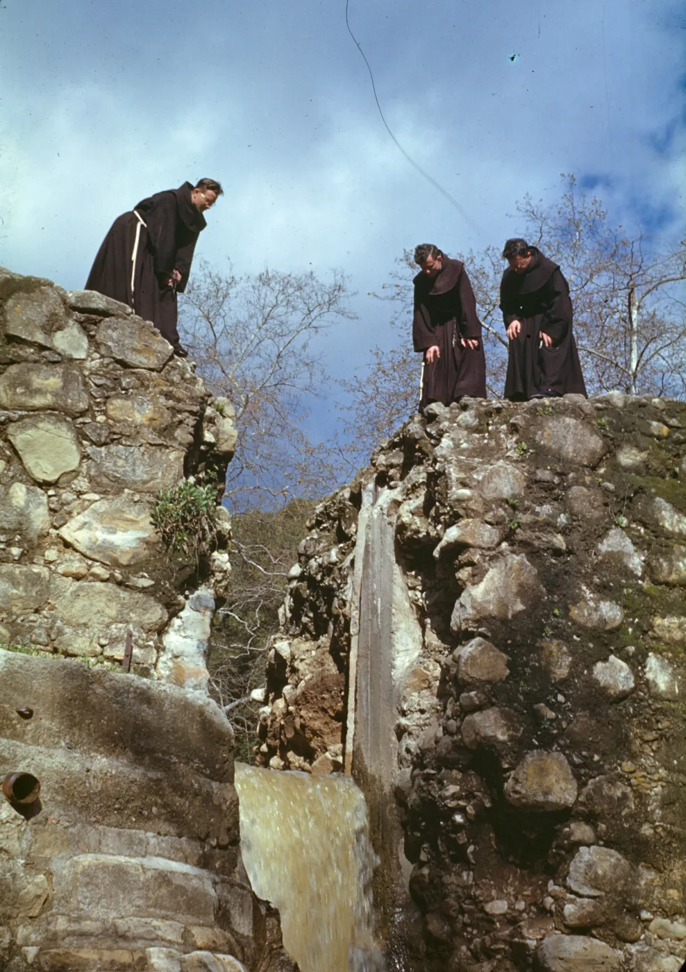 Padres (friars) on Mission Dam