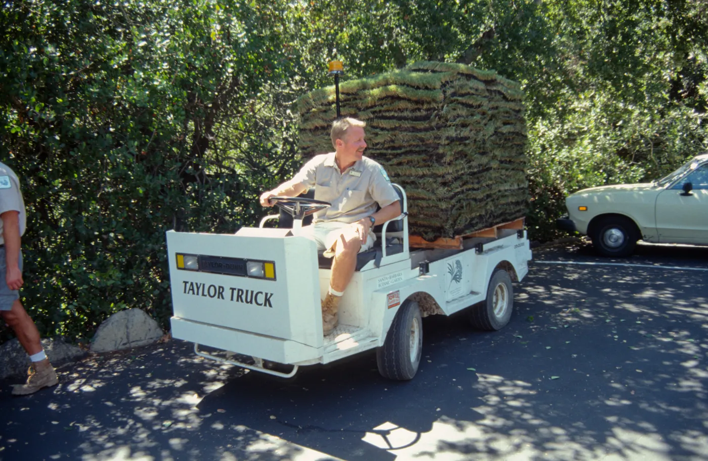 Dave Kershaw moving sod for the new lawn installation with the Taylor Truck