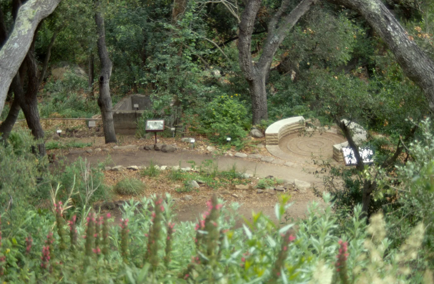 Distance view of Fiber Arts Display and spiral bench