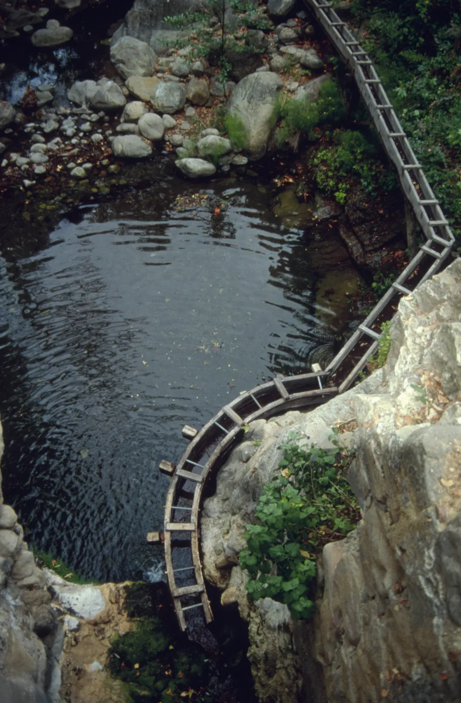 Wooden aqueduct from above, below Mission Dam wall