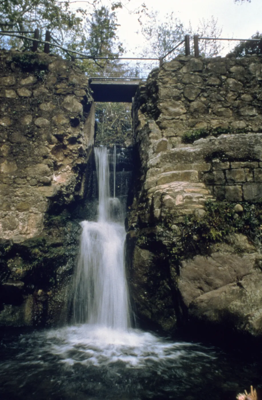 Mission Dam waterfall, wooden foot bridge at top of Mission Dam