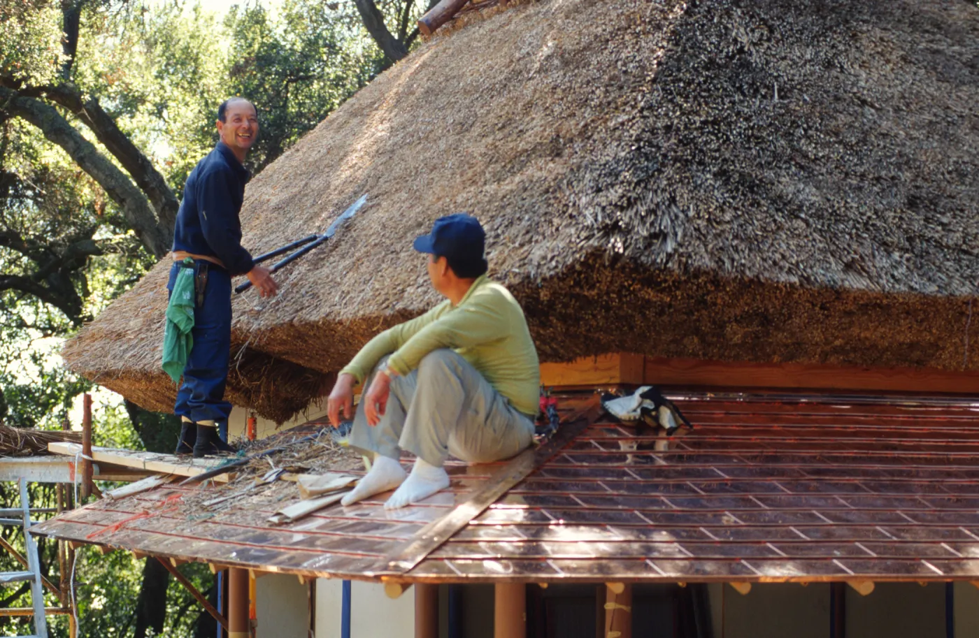 tea house construction copper and thatched roofing ©Marie Gayeski