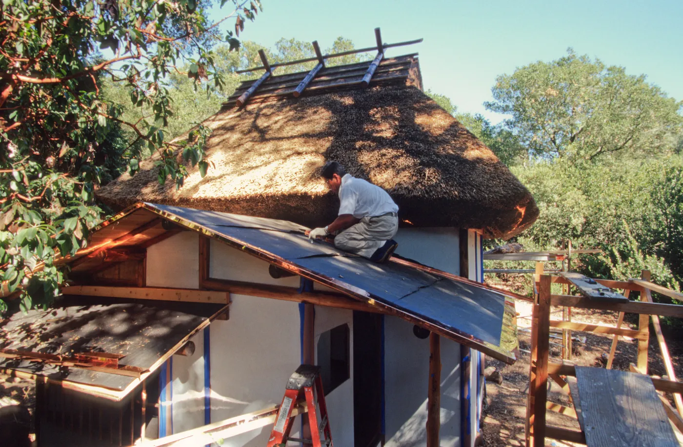 tea house construction copper and thatched roofing ©Marie Gayeski