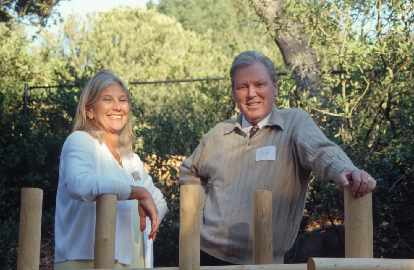 Nancy johnson at tea house fence