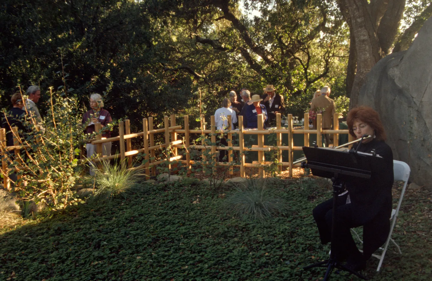 flutist at tea house event