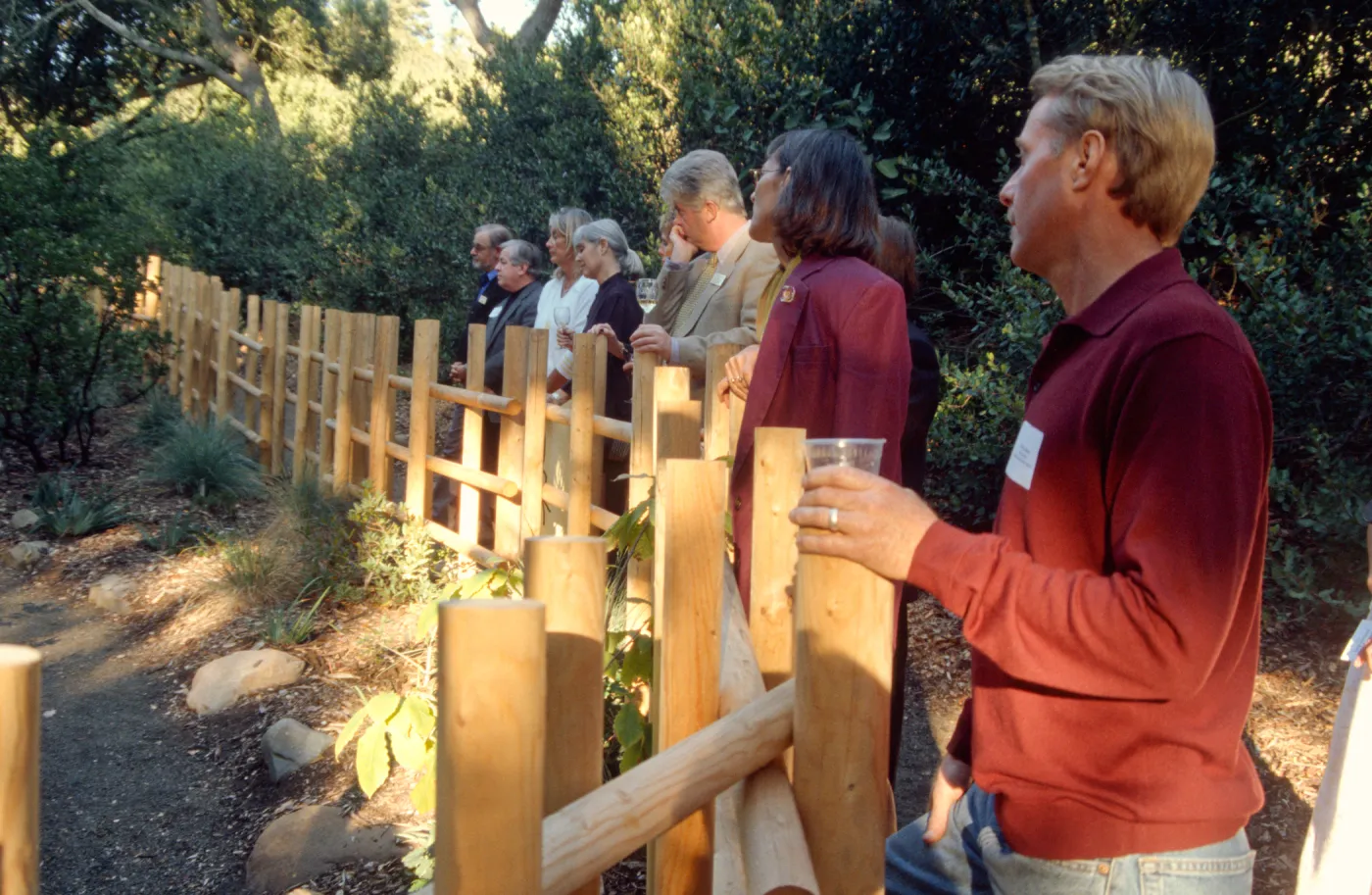 garden employees and guests at tea house event