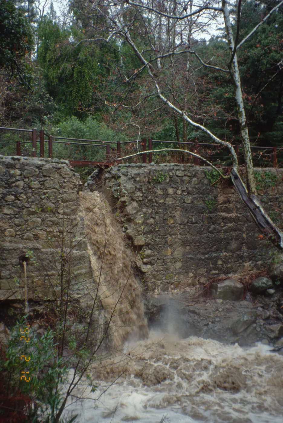 Mission Creek flooding through Mission Dam