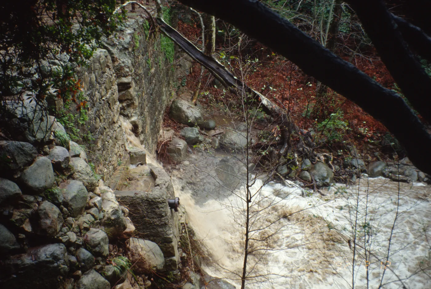 Mission Creek flooding through Mission Dam