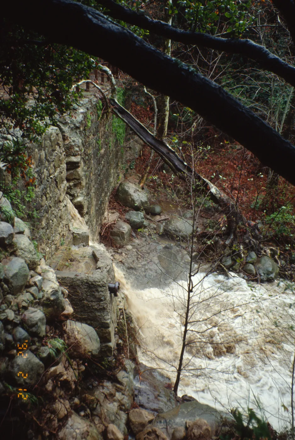 Mission Creek flooding through the Mission Dam