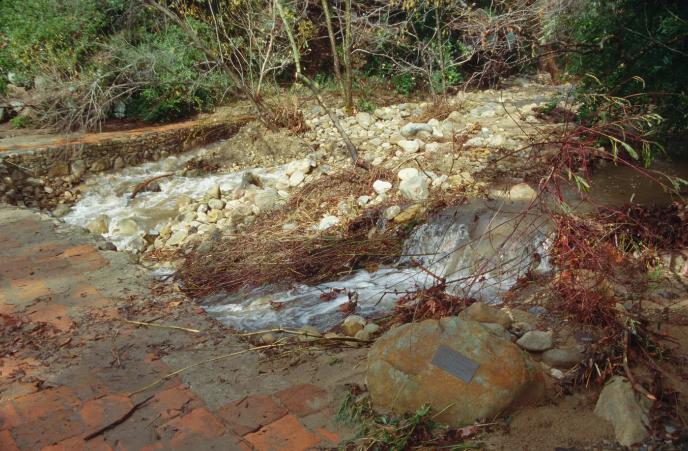 Mission Creek at flood stage above the Mission Dam