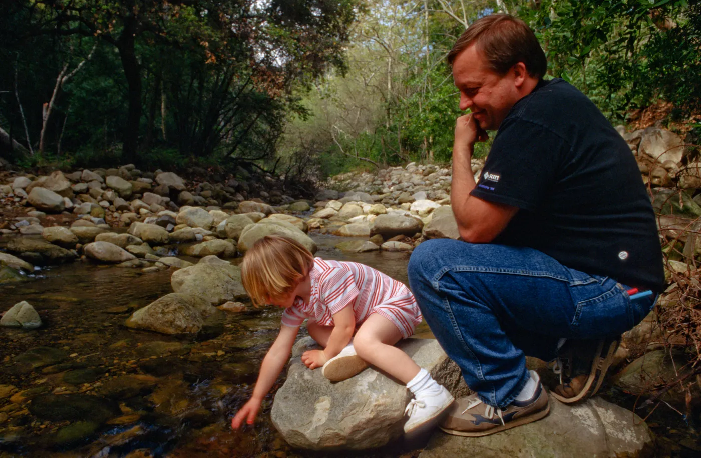 child and father, Mission Creek, Celebration of Trees 1996