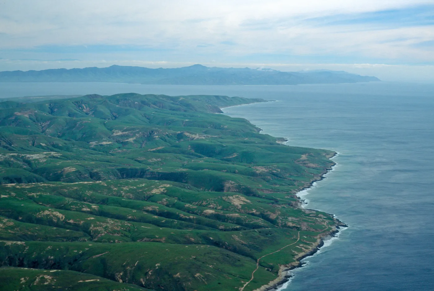 Santa Rosa Island, Southeast end, Santa Cruz is in background