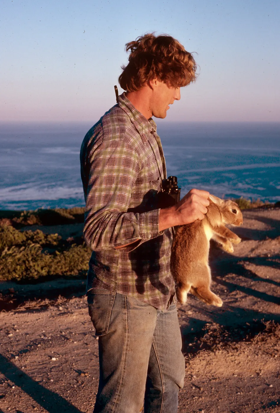 Wayne Pero, National Park Service employee, rabbit caught by Signal Peak, Santa Barbara Island