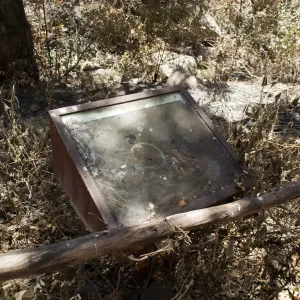 burned Fiber Arts Display case after the Jesusita Fire