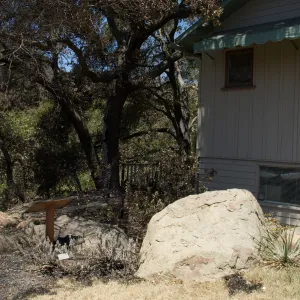 burned wood deck along canyon rim, adjacent to cottage, after the Jesusita Fire