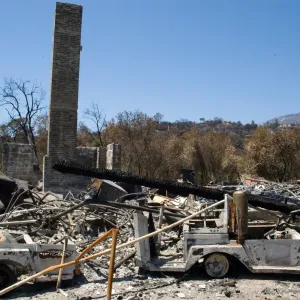 burned vehicles at the Gane House site, after the Jesusita Fire