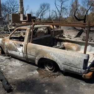 burned truck in front of Gane House after the Jesusita Fire