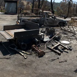 burned vehicles at the Gane House site, after the Jesusita Fire