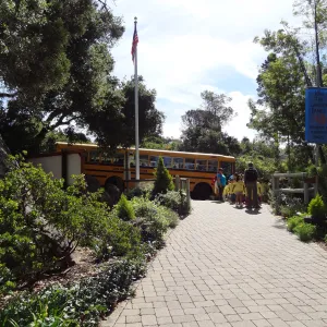 school bus arriving at Garden Entrance