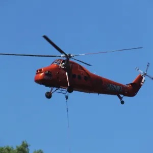 Sikorsky S-58T Screaming Mimi helicopter replacing utility pole in west Mission Canyon