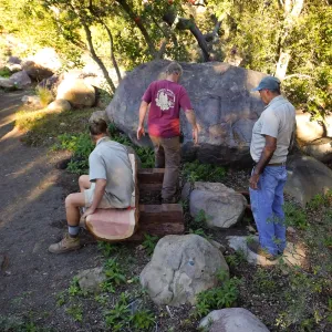 Installation of the Bobbie Jones bench, made from the giant sequoia removed from the Arroyo Section