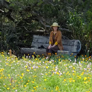 Visitor admiring Meadow from Thomas Holton Bench