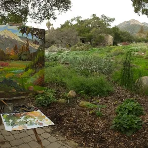 Plein Air artist Chris Potter with painting of Meadow