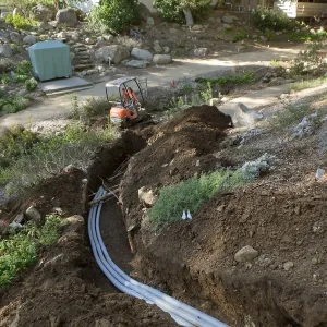 Power and data conduit being installed in the Arroyo Section